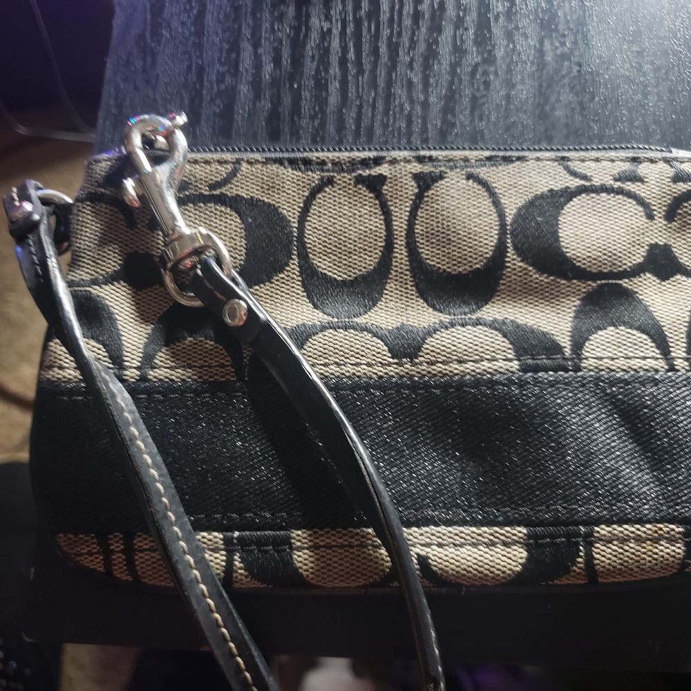 Coach Black and Tan Women's Wristlet.